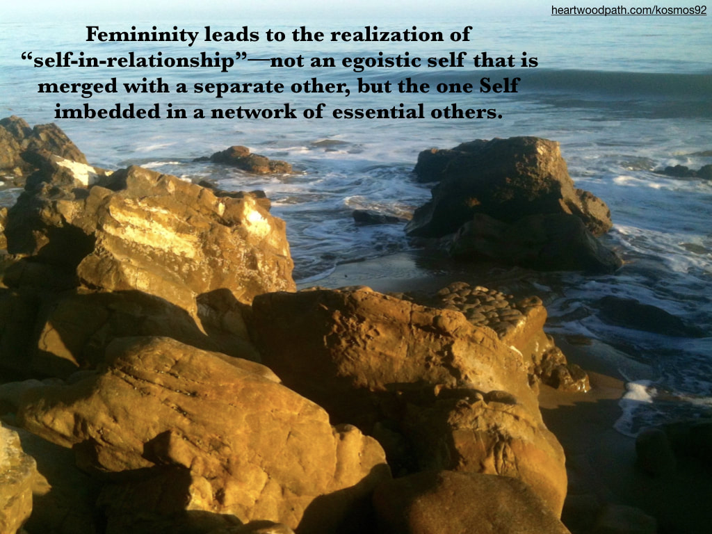 Picture rocky beach with quote Femininity leads to the realization of “self-in-relationship”--not an egoistic self that is merged with a separate other, but the one Self imbedded in a network of essential others